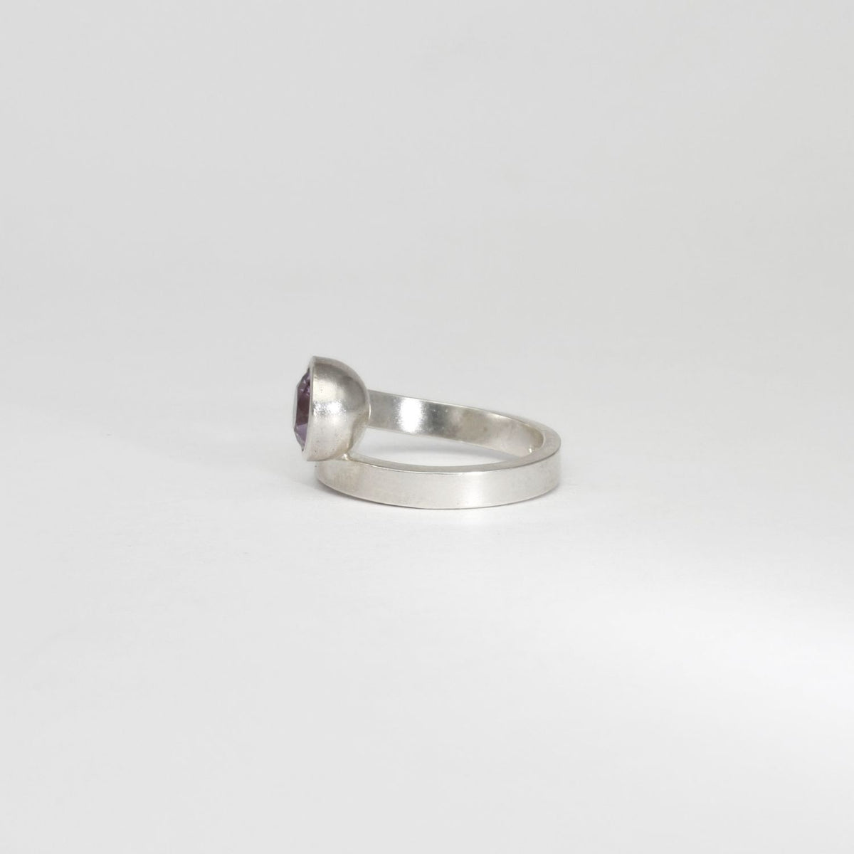 Ribbon end silver ring with lavender amethyst by Jodie Hook