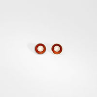 Small orange target silver studs by Kokkino