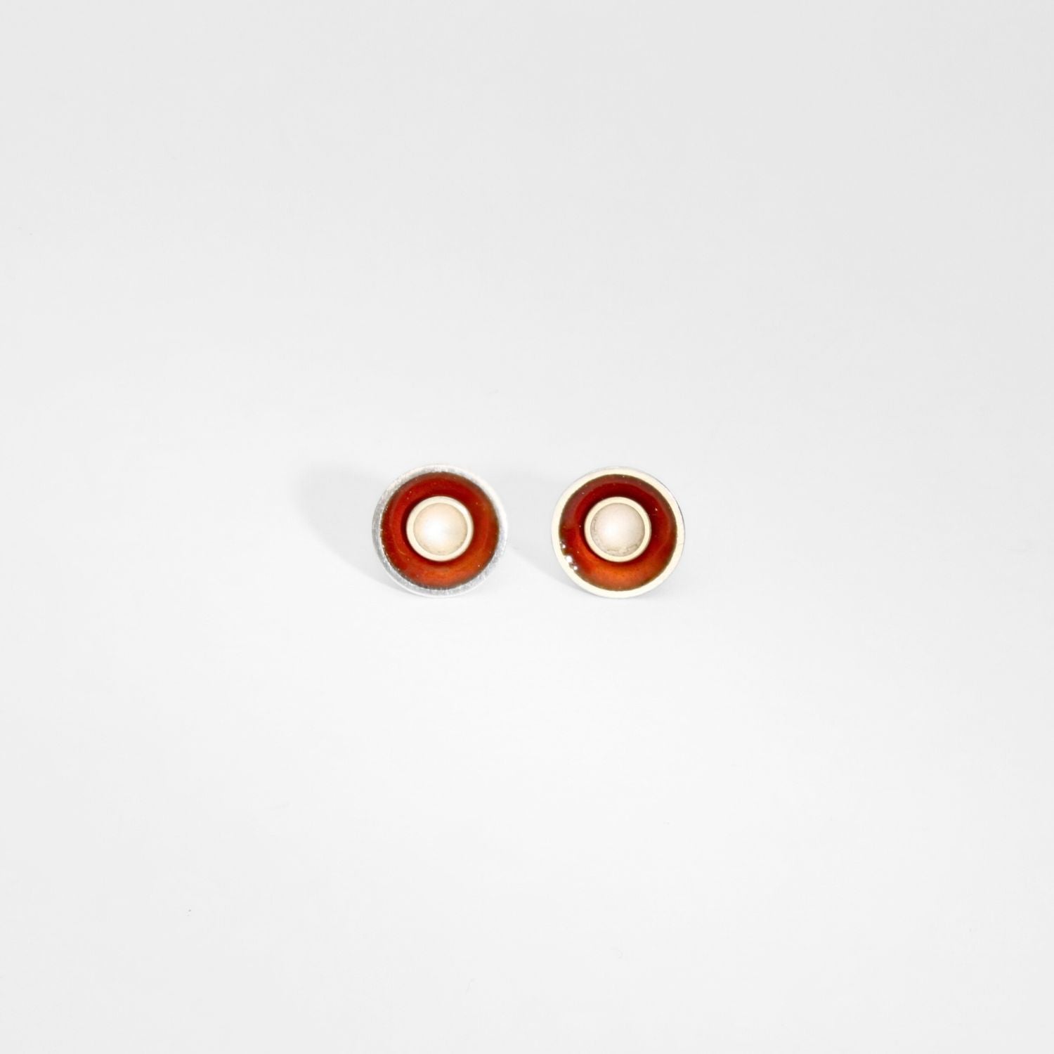 Small orange target silver studs by Kokkino