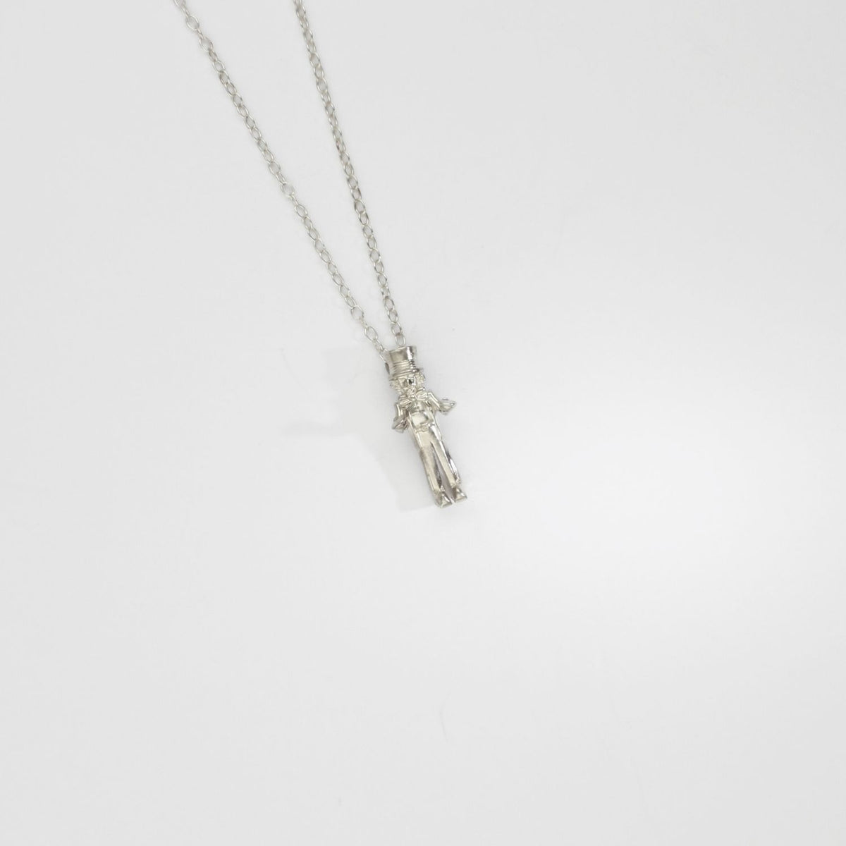 Alice in Wonderland - Mad hatter silver pendant by Katy Tromans