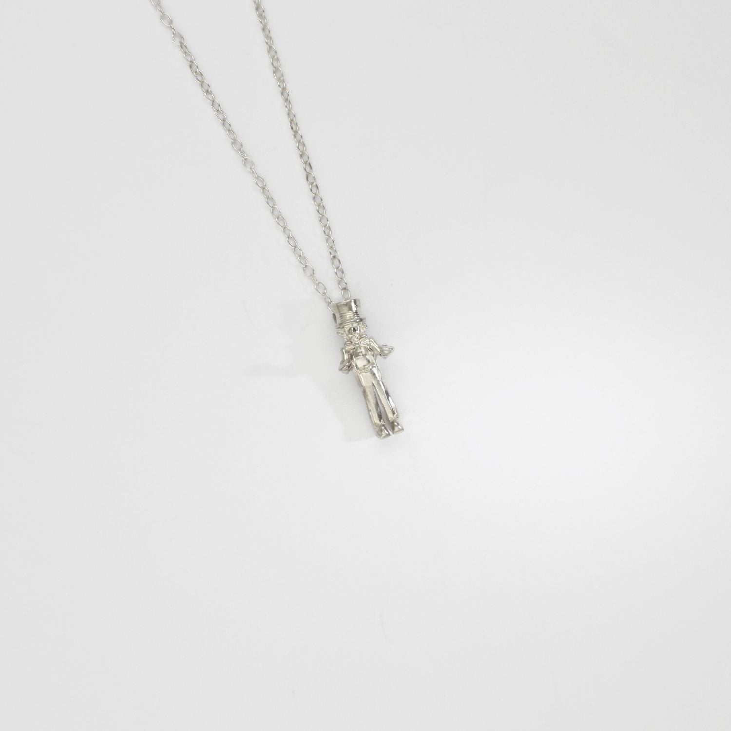 Alice in Wonderland - Mad hatter silver pendant by Katy Tromans