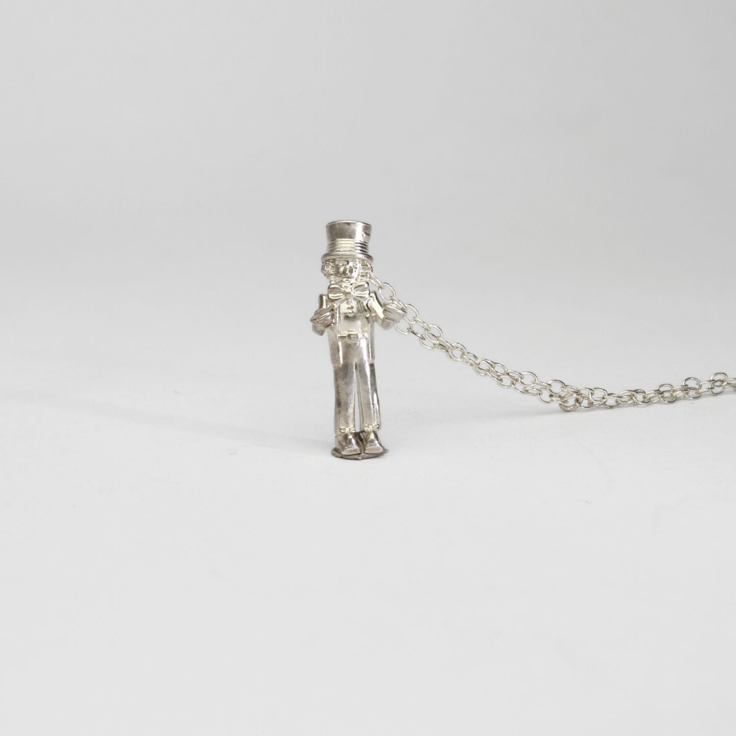 Alice in Wonderland - Mad hatter silver pendant by Katy Tromans