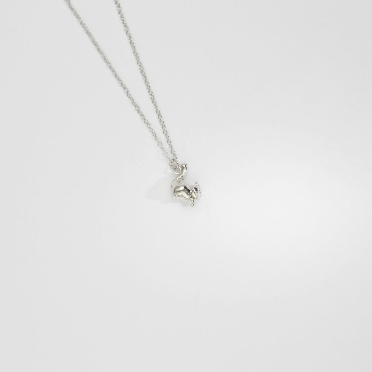 Alice in Wounderland - Cheshire cat silver pendant by Katy Tromans