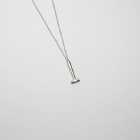 Flat end Hammer silver pendant by Katy Tromans