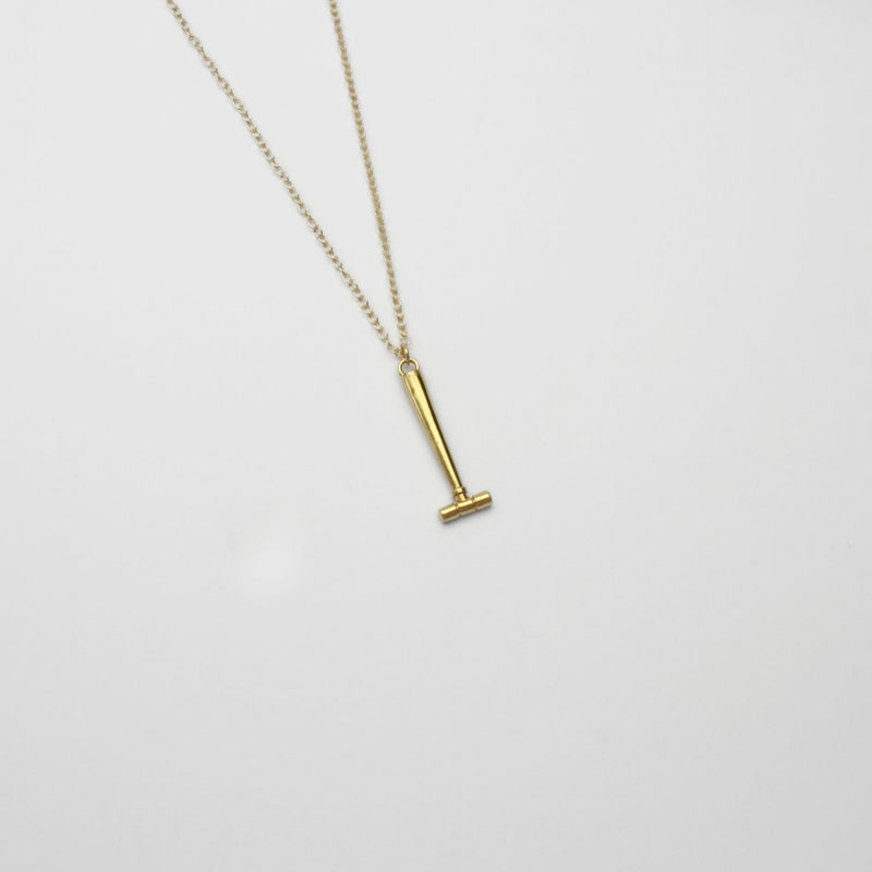 Parallel hammer gold plated silver pendant by Katy Tromans