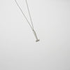 Parallel hammer silver pendant by Katy Tromans