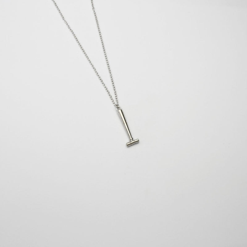 Parallel hammer silver pendant by Katy Tromans
