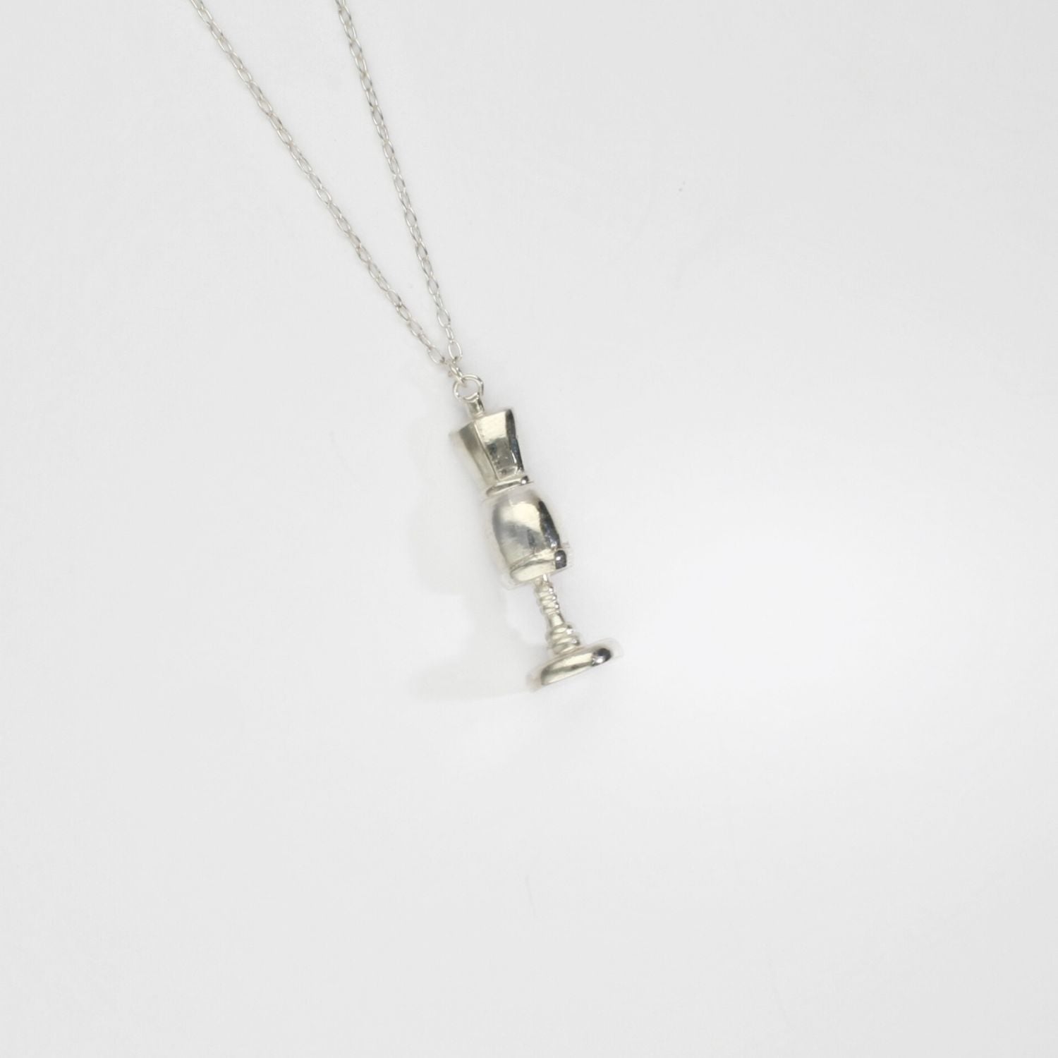 Silver bust pendant by Katy Tromans