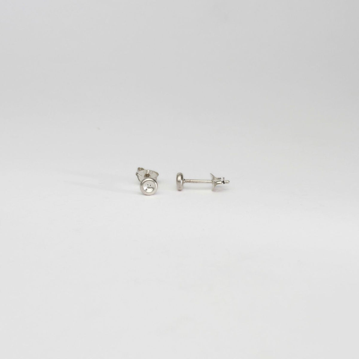 Button silver earrings by Katy Tromans