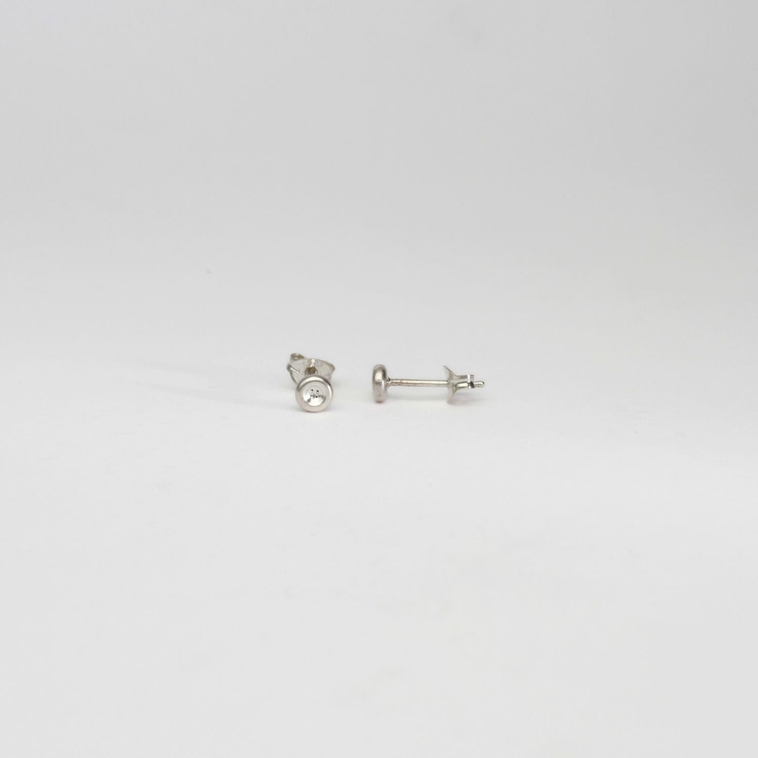 Button silver earrings by Katy Tromans