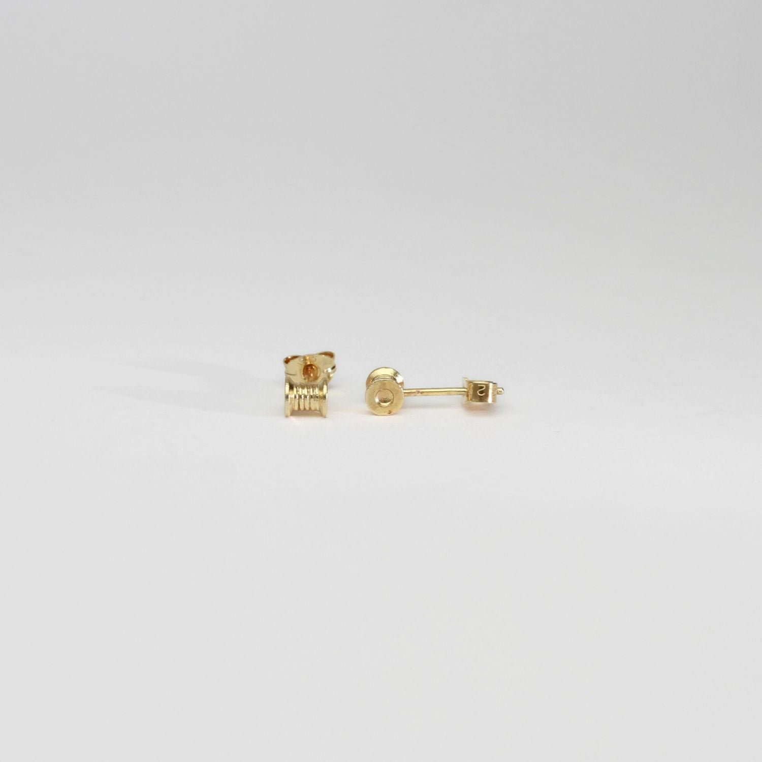 Cotton reels silver gold plated earrings by Katy Tromans