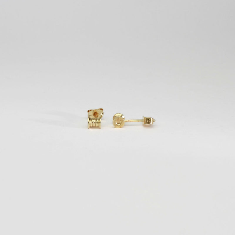 Cotton reels silver gold plated earrings by Katy Tromans