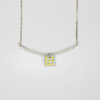 Small square Carthen silver pendant by Kathryn Willis