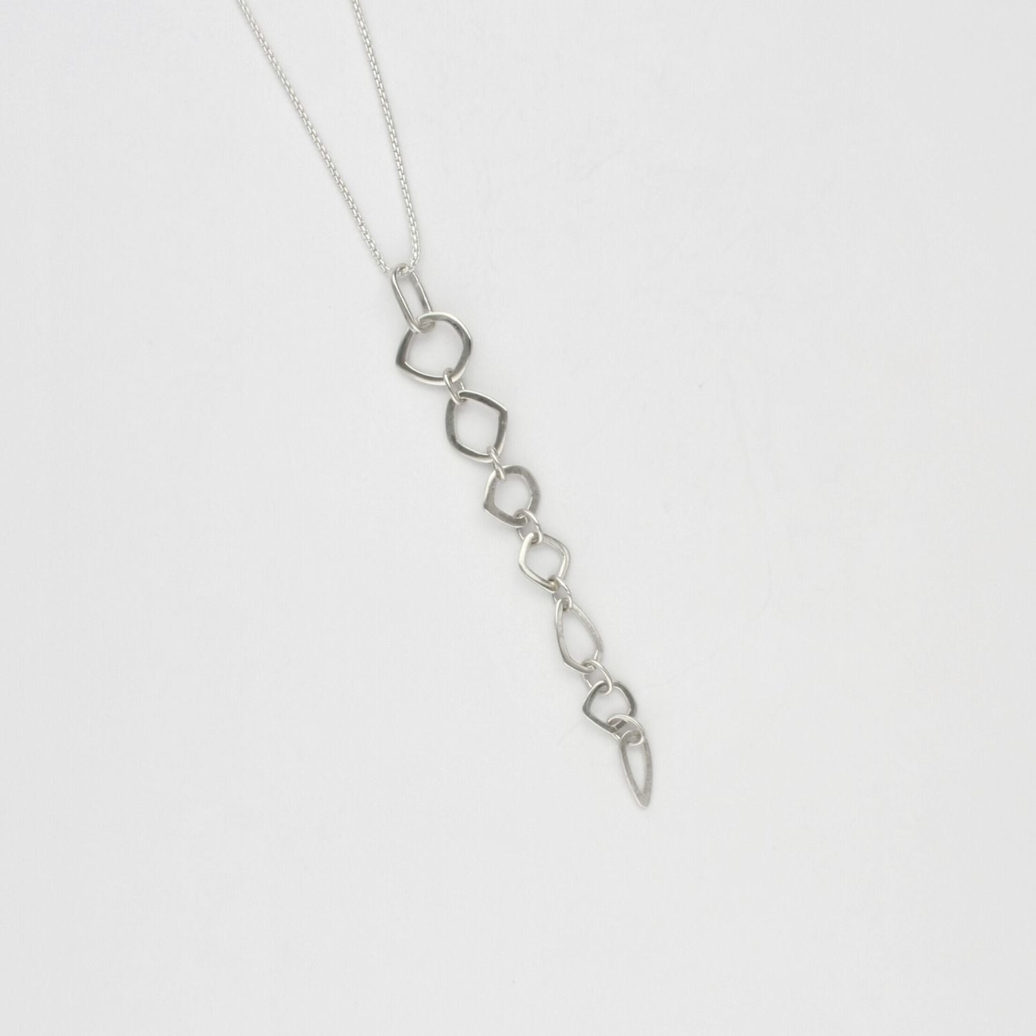Neptunea 7 drop silver pendant by Karen Williams