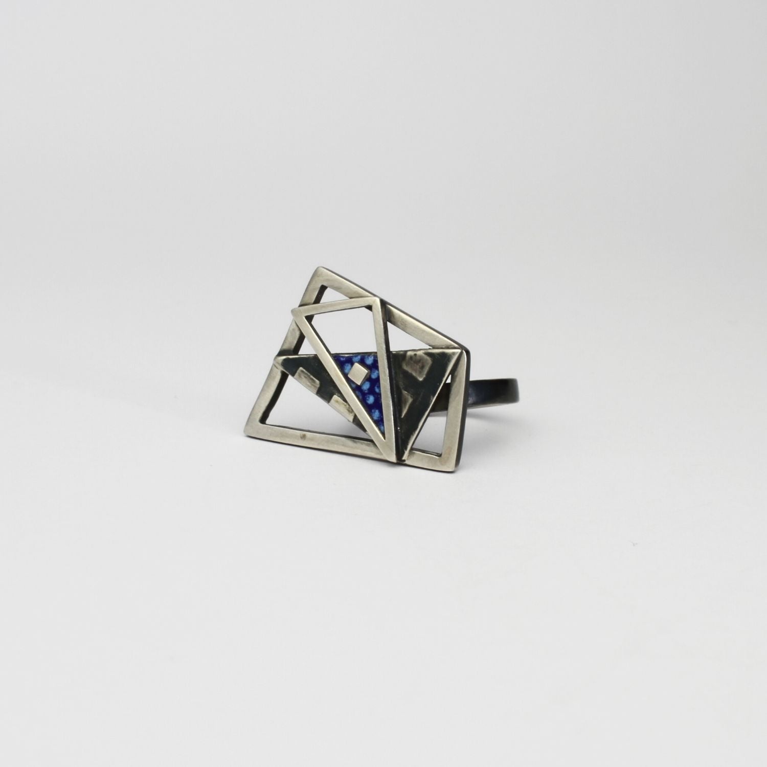 Weave cocktail black silver ring with blue enamel by Kathryn Willis