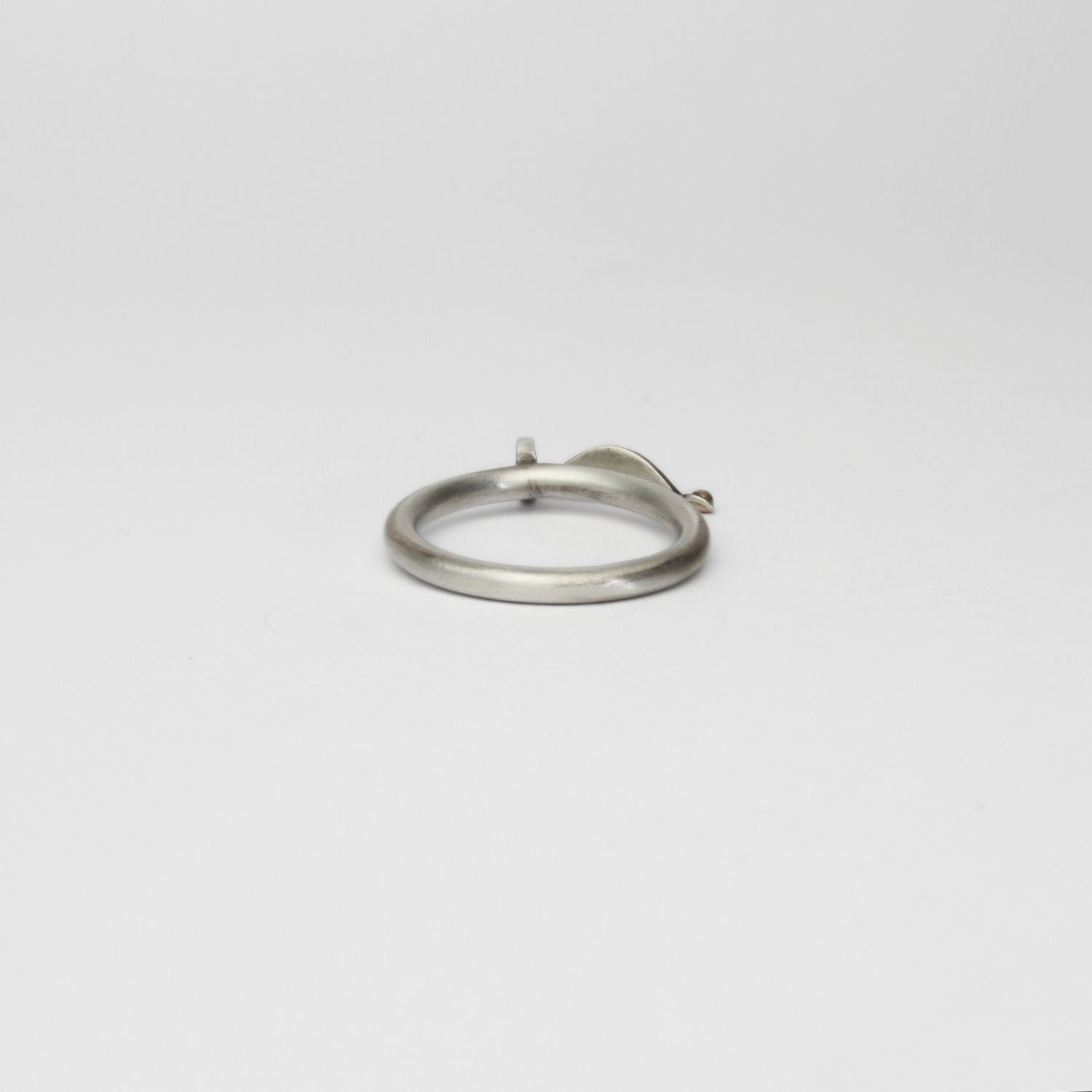 Folded leaf  black silver ring with 9ct gold by Kathryn Willis