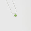 Small green spot silver pendant by Kathryn Willis