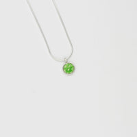 Small green spot silver pendant by Kathryn Willis
