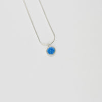Small blue spot silver pendant by Kathryn Willis