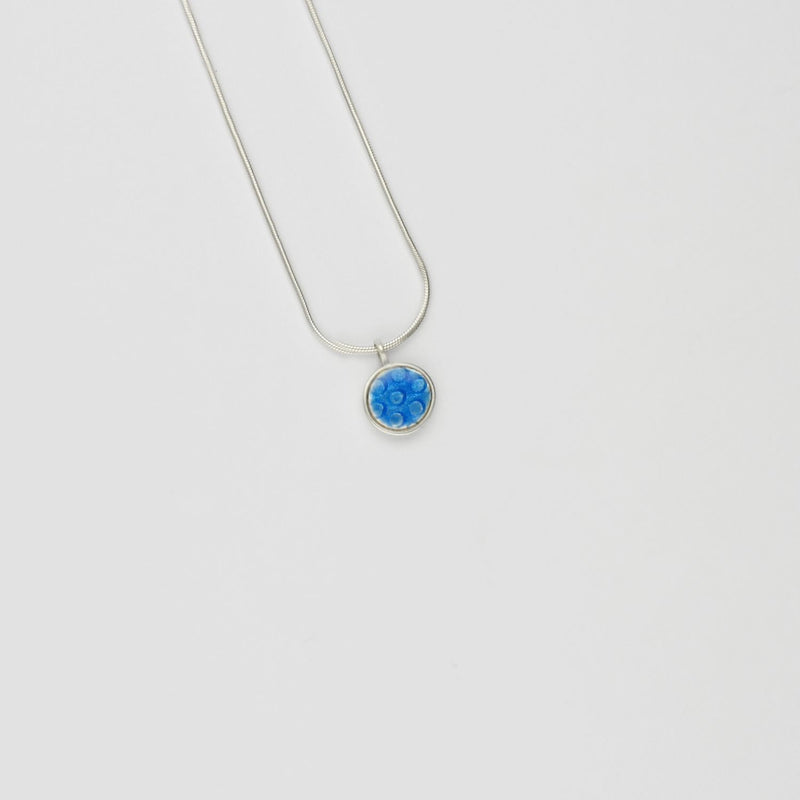 Small blue spot silver pendant by Kathryn Willis