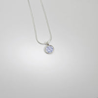Small lilac spot silver pendant by Kathryn Willis