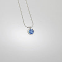 Small blue/purple spot silver pendant by Kathryn Willis