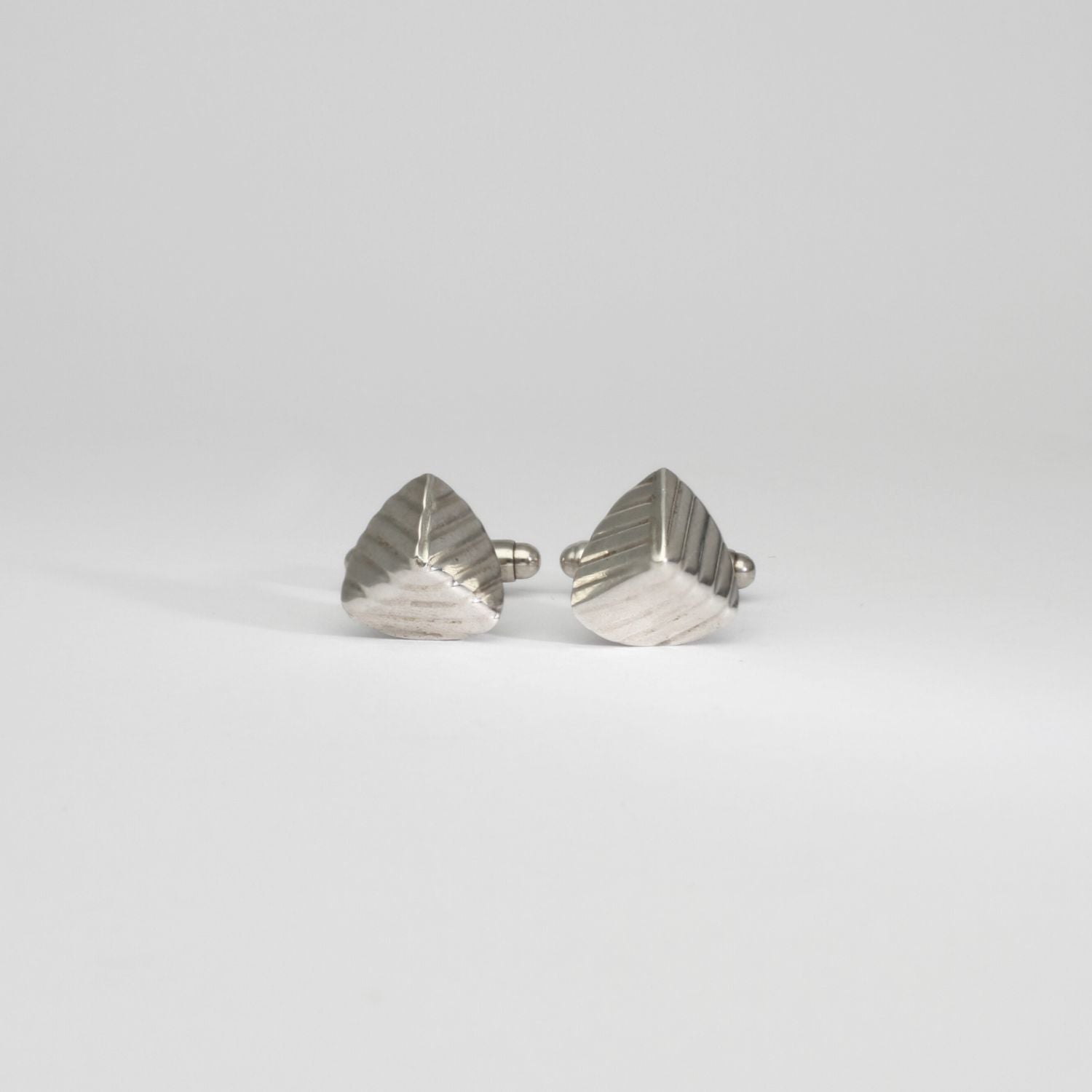 Tricornel ridged silver cufflinks by Karen Williams