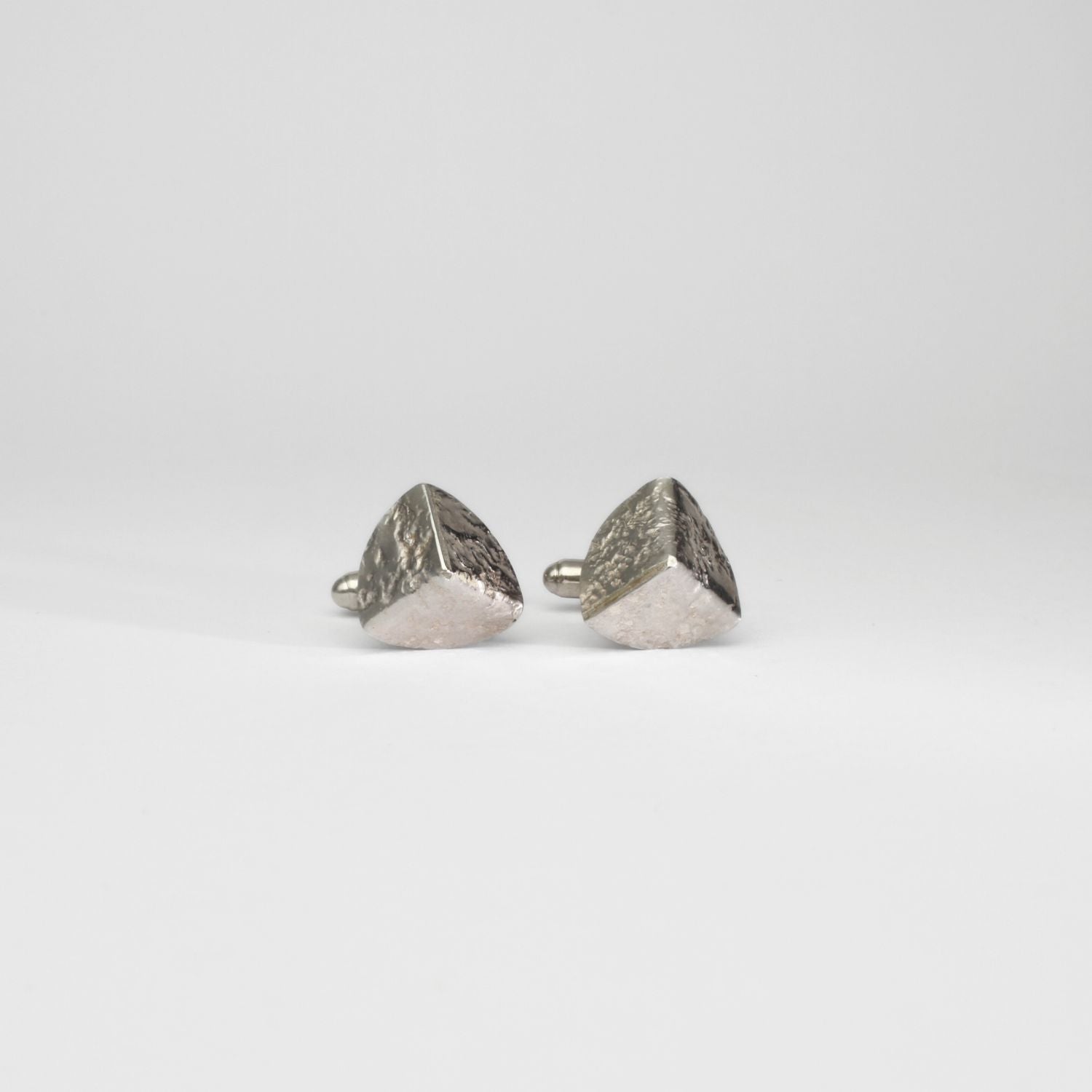 Tricornel decay silver cufflinks by Karen Williams