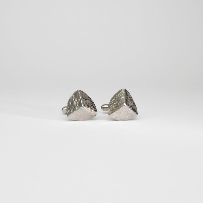 Tricornel decay silver cufflinks by Karen Williams