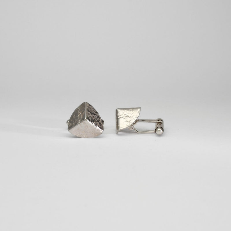 Tricornel decay silver cufflinks by Karen Williams