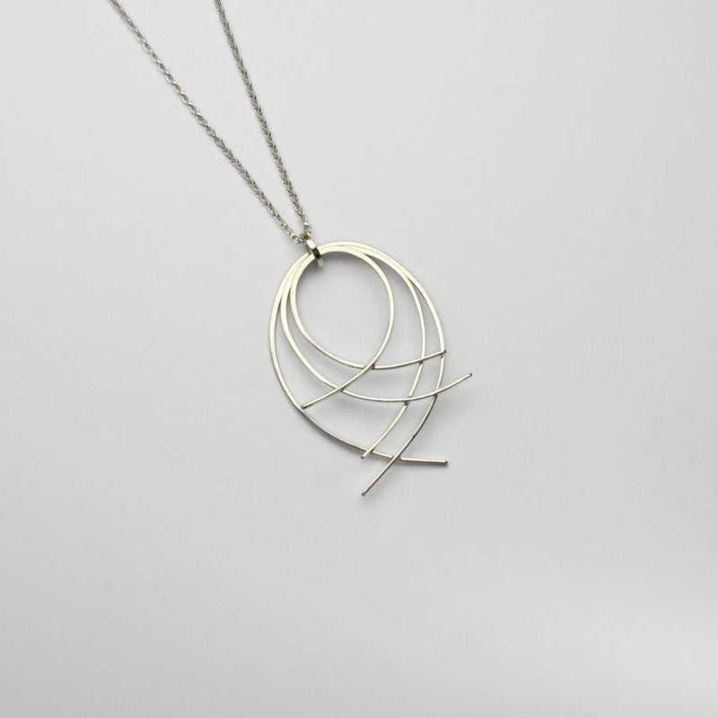 Filament netted silver pendant by Karen Williams