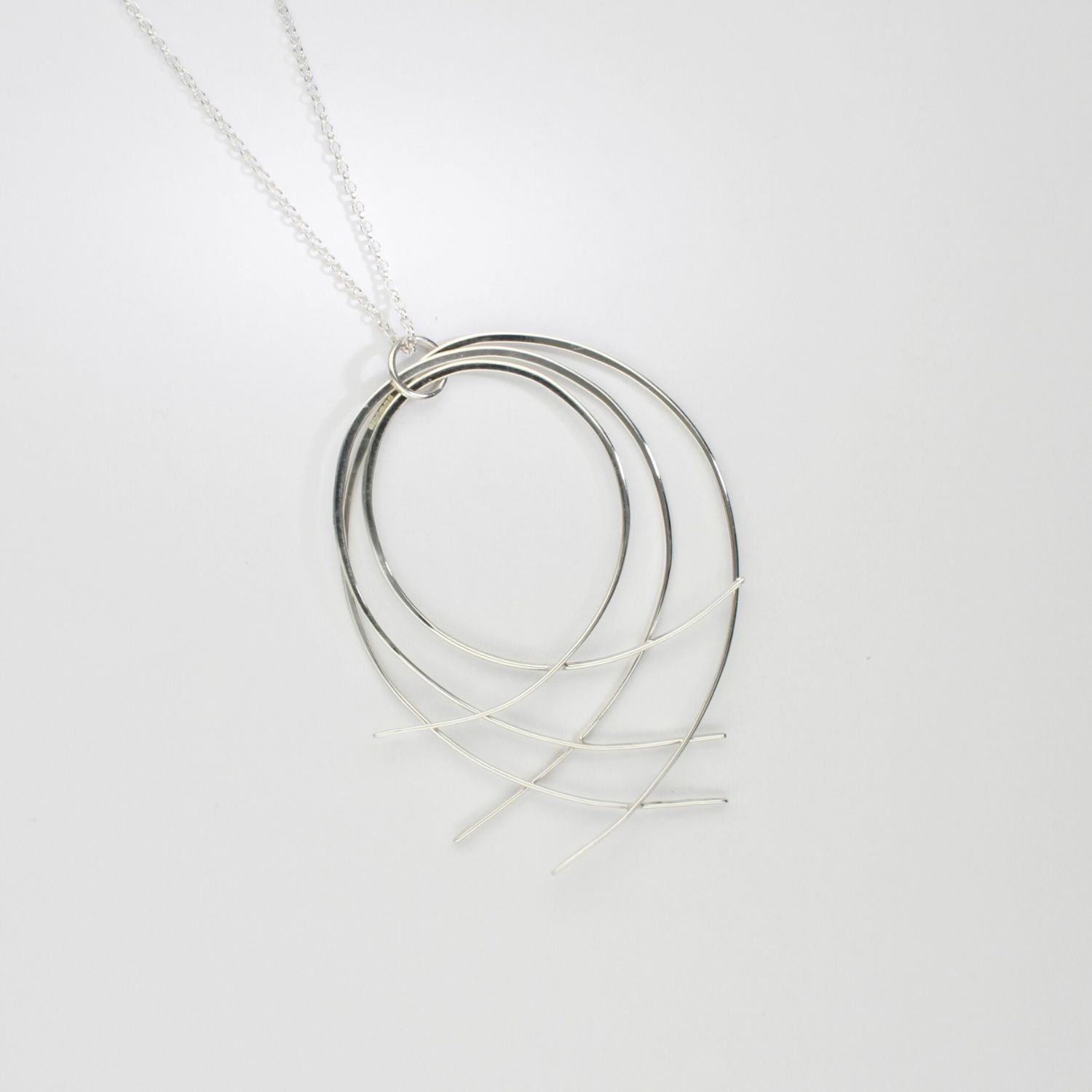 Filament netted large silver pendant by Karen Williams