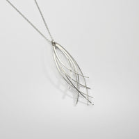Filament long 4 strand silver pendant by Karen Williams