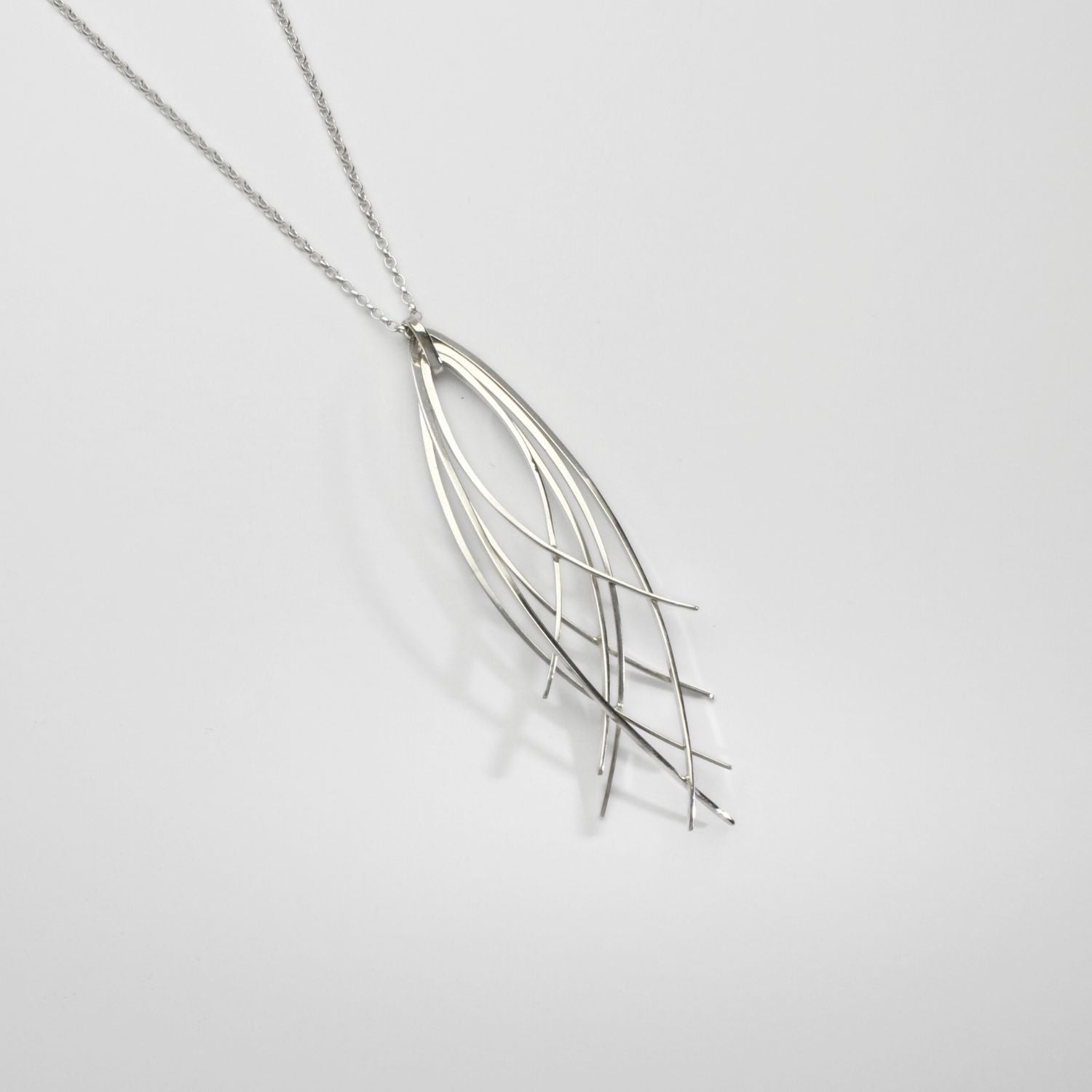 Filament long 4 strand silver pendant by Karen Williams