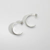 Wide pod silver hoop earrings by Karen Williams