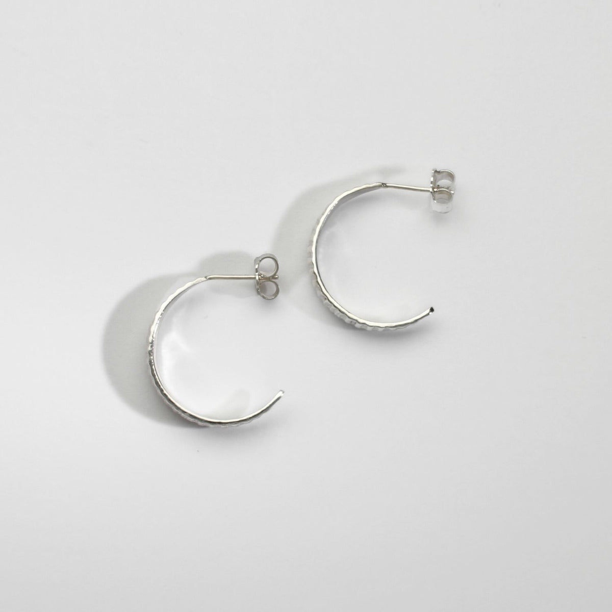 Wide pod silver hoops by Karen Williams