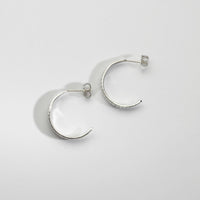 Wide pod silver hoop earrings by Karen Williams