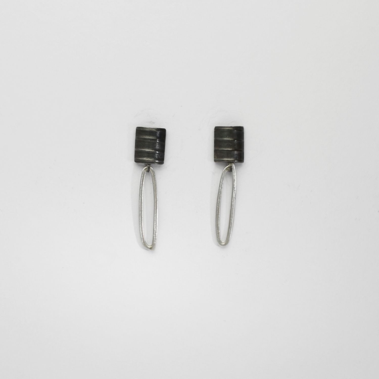 Sea oak textured drop earrings black silver by Karen Williams
