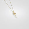 9ct gold eco trio whelk & pearl pendant by Karen Williams