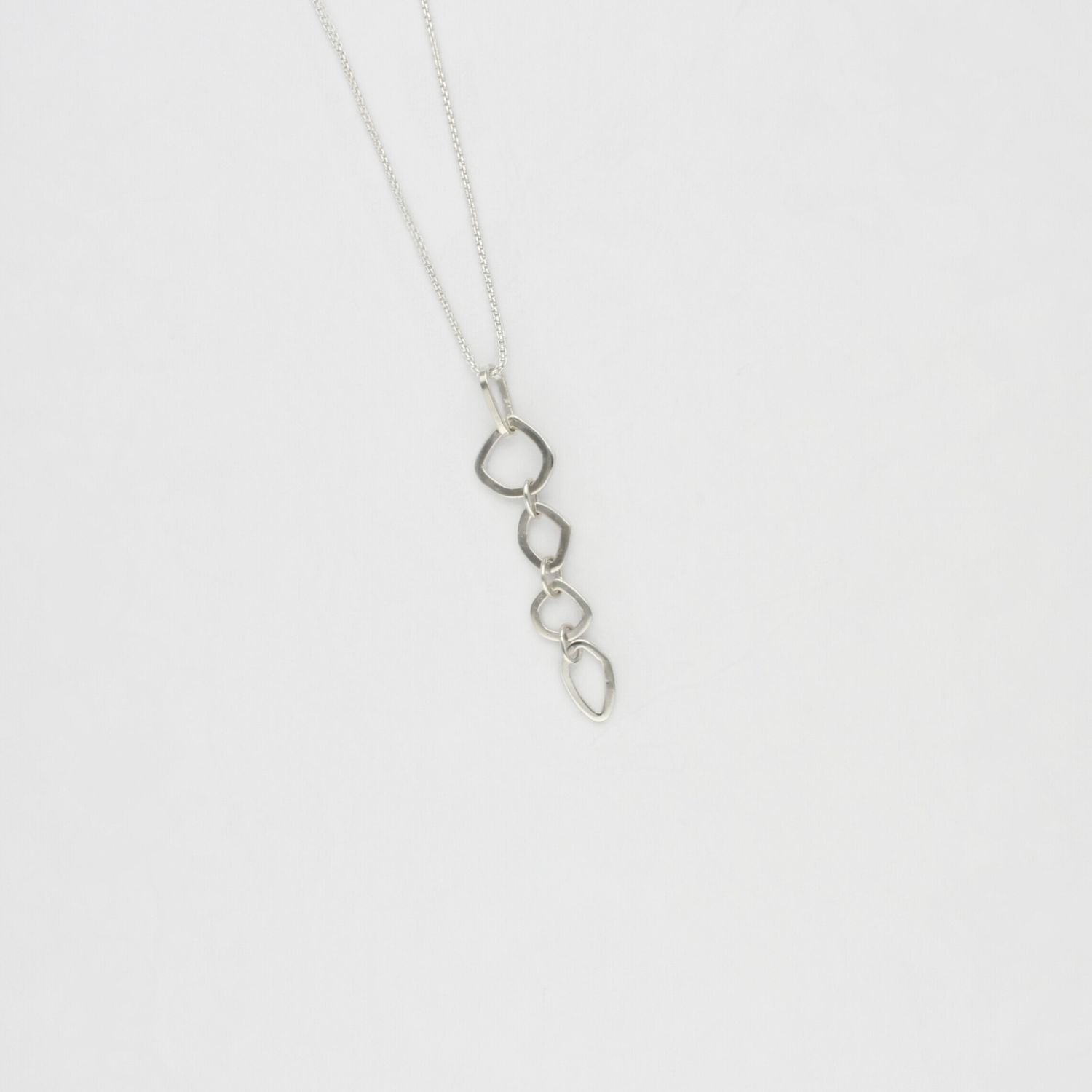 Neptunea 4 drop silver pendant by Karen Williams