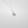 Mini silver birdcage pendant by Kate Wimbush