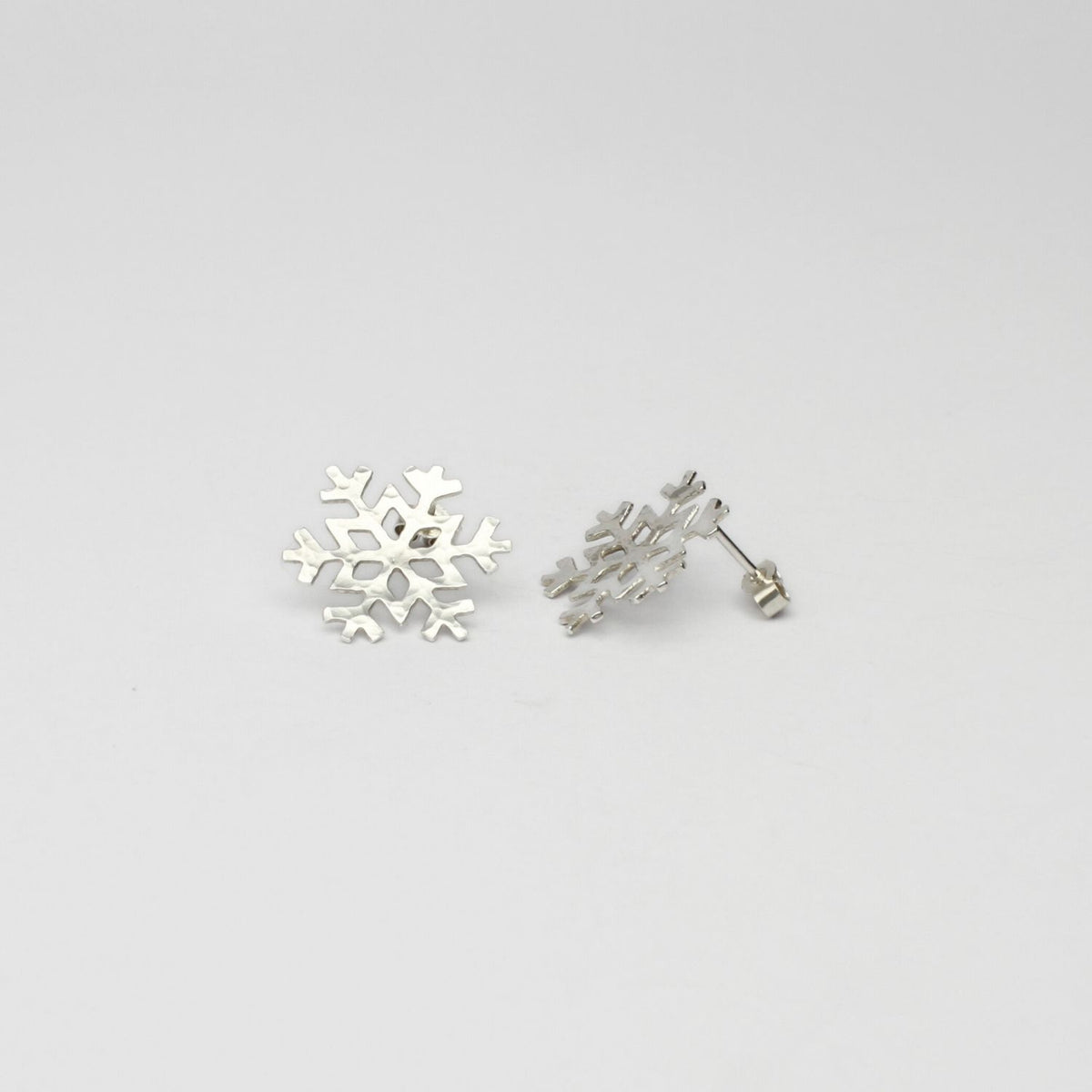 Large snowflake silver studs by Kate Wimbush