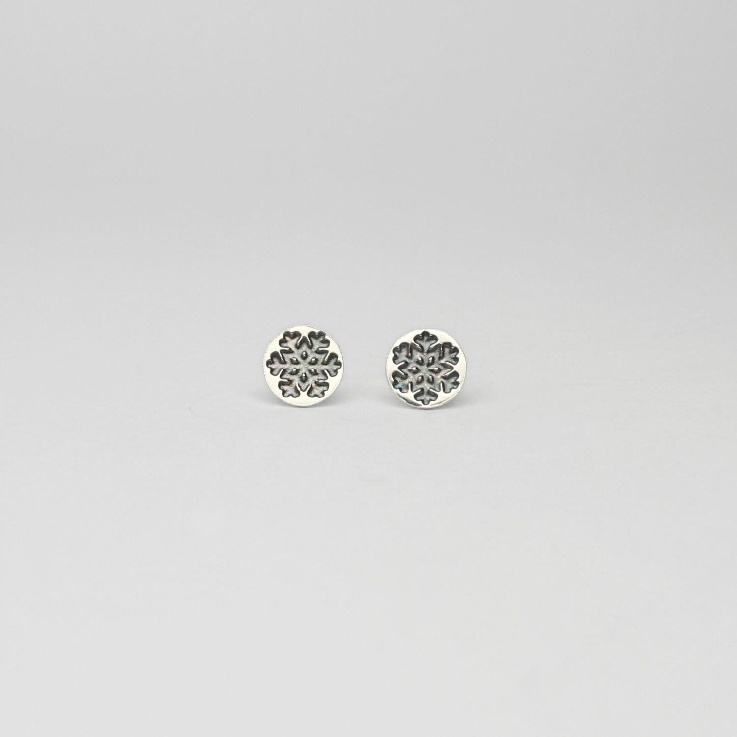 Round snowflake black silver studs by Kate Wimbush