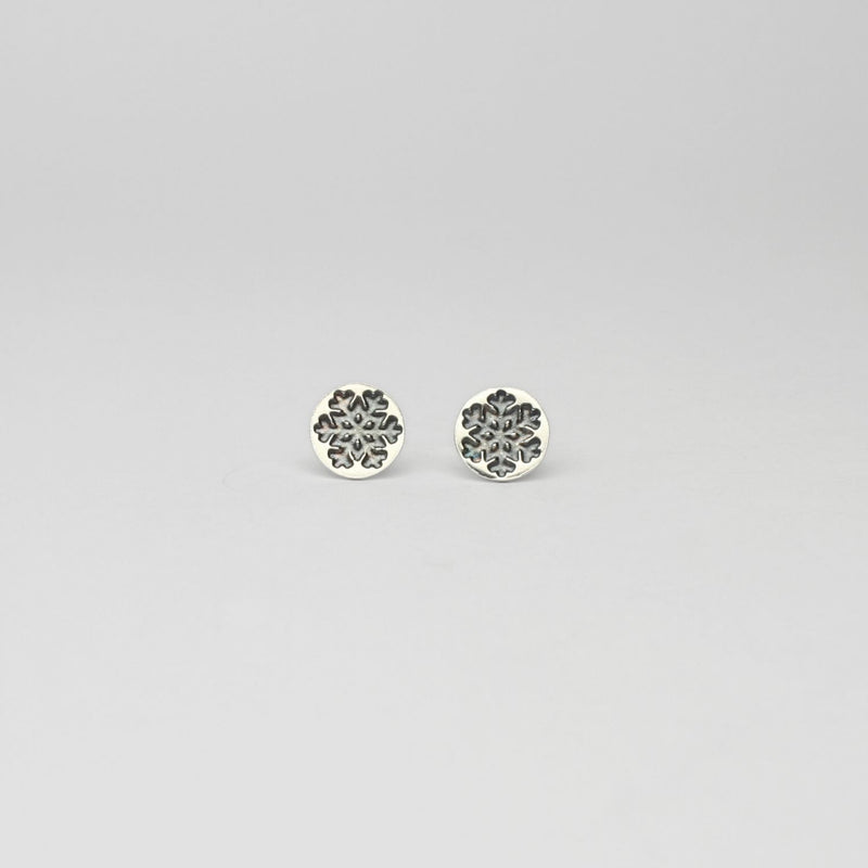 Round snowflake black silver studs by Kate Wimbush