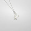 Anchor and lighthouse silver pendant by Kate Wimbush