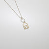Beach hut silver & 9ct gold pendant by Kate Wimbush