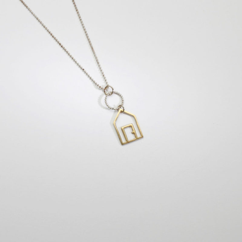 Beach hut silver & 9ct gold pendant by Kate Wimbush