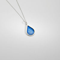 Blue raindrop silver & resin pendant by Kate Wimbush