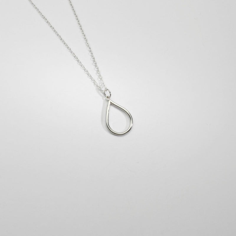 Small single Raindrop silver pendant by Kate Wimbush