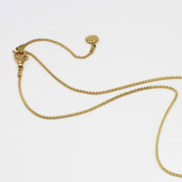 First of March at Collect 2025 - Mari Thomas 18ct gold pendant